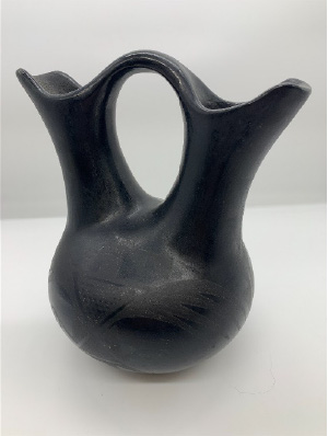 Photo of Black Pottery Vase with two spouts